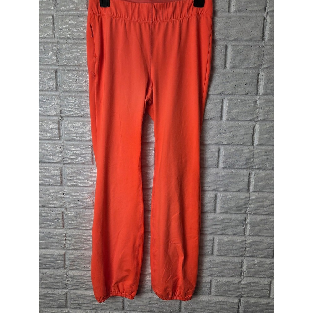FREE PEOPLE Size Small Women's joggers pull on Bright orange Zipper pockets